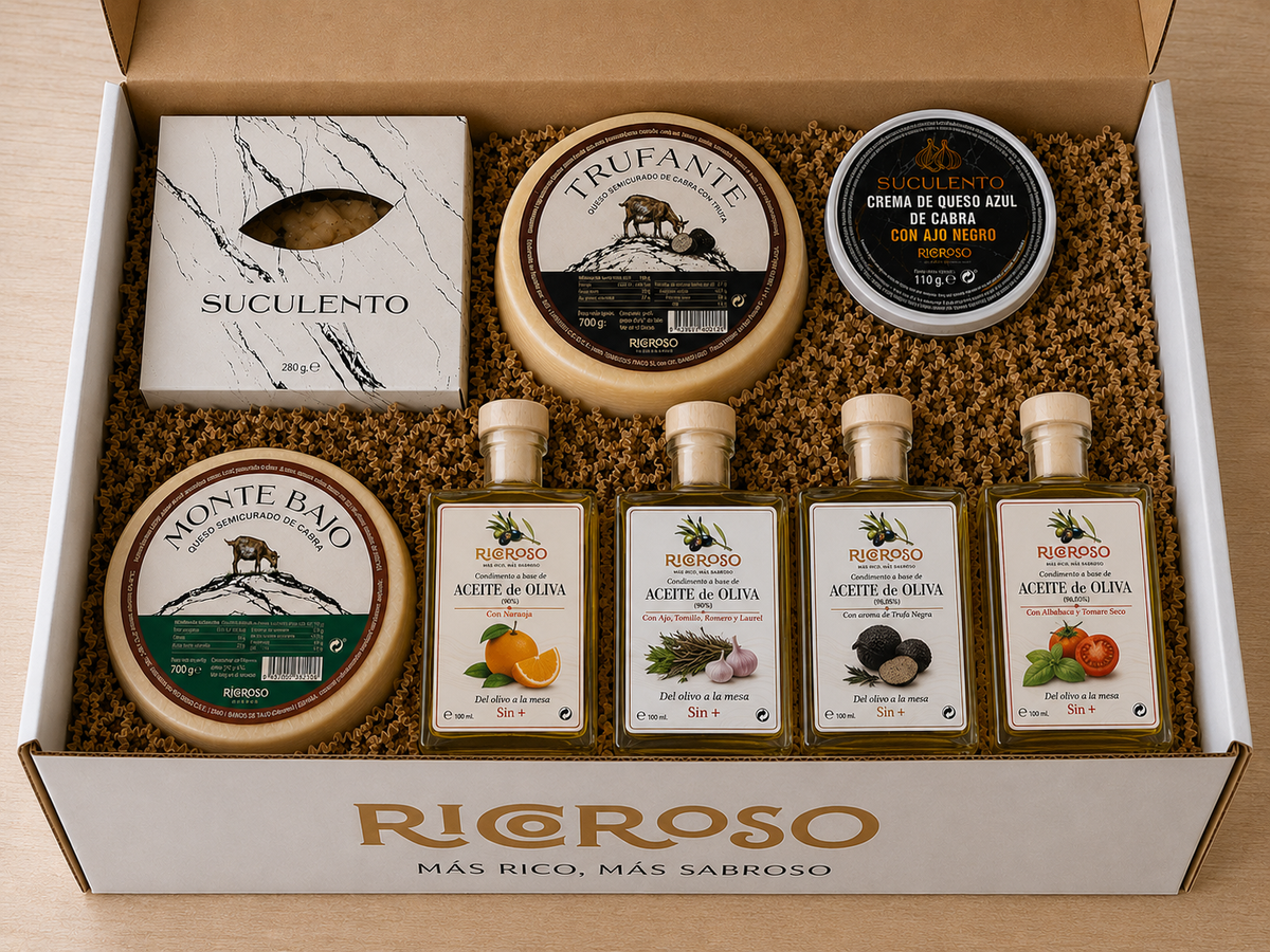 Caja Ricoroso abierta con el Lote La Tabla: quesos de cabra Trufante, Montebajo y Suculento, crema de queso azul con ajo negro y cuatro aceites aromatizados.